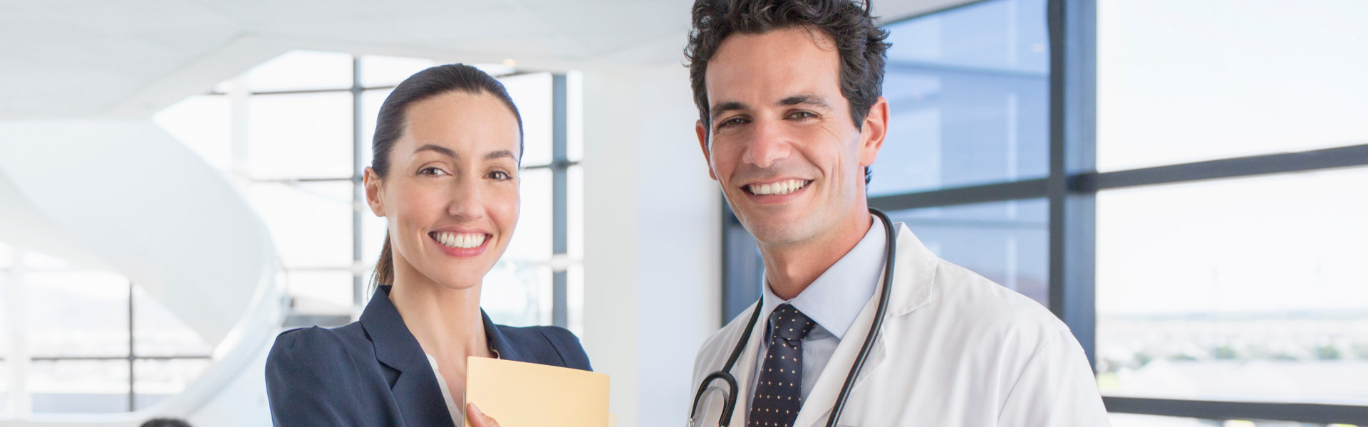 man and a woman smiling